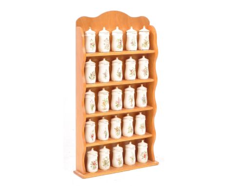 A collection of vintage 1980s and 1990s Flower Fairy ceramic lidded spice jars by Gresham Marketing, examples including Celer