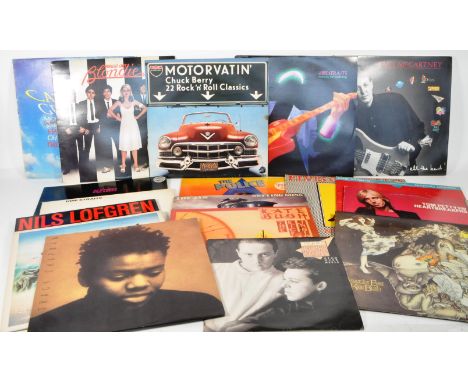 A collection of vintage 20th century rock / prog rock / psychedelic rock vinyl record albums. Featuring artists Paul McCartne