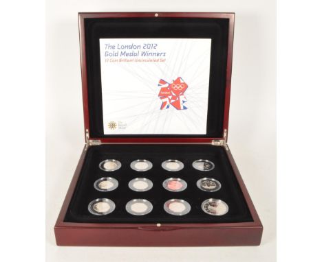 The Royal Mint - The London 2012 gold medal winners from the Olympics. 12 coin brilliant uncirculated set. The 50p pence coin