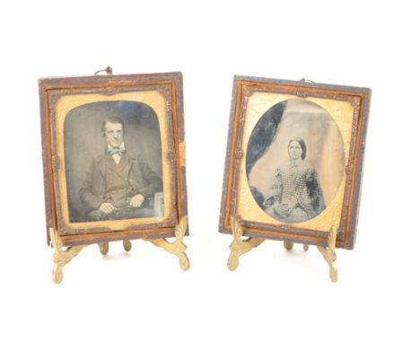 Two 19th century Victorian ambrotype photographs depicting a man and a woman. Framed, mounted and glazed measuring approx. 9.