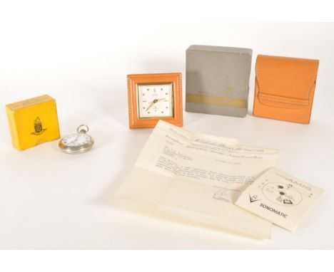 A mid 20th century CYMA Sonomatic alarm clock alongside a Hamilton pocket watch. The collection to includeHamilton Watch Co, 