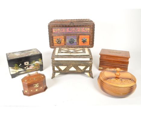Collection of 20th century wooden lidded boxes. Including brass inlaid examples, Chinese hand painted jewellery music box, bo