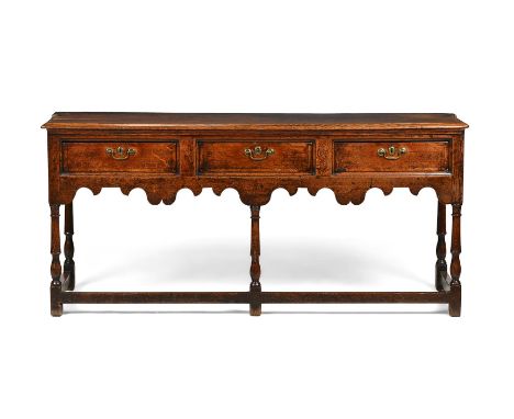 A GEORGE I OAK DRESSER EARLY 18TH CENTURY 82cm high, 179cm wide, 51cm deep