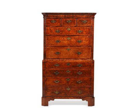 A FINE GEORGE I BURR WALNUT CHEST ON CHEST  CIRCA 1725 Crossbanded and feather inlaid throughout, the graduated drawers flank