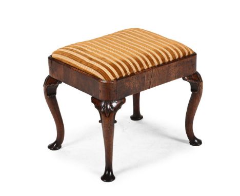 A GEORGE I WALNUT STOOL  CIRCA 1725  43cm high, 48.5cm wide, 42cm deep   Condition Report:  Stool with the marks, knocks, scr