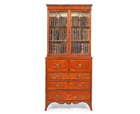 Y  A GEORGE III SATINWOOD AND TULIPWOOD BANDED SECRETAIRE BOOKCASE IN THE MANNER OF INCE AND MAYHEW, CIRCA 1770 The glazed to