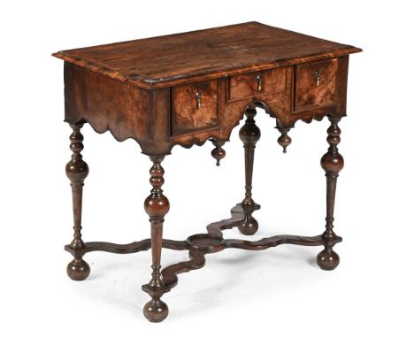A QUEEN ANNE WALNUT AND FEATHERBANDED SIDE TABLE CIRCA 1710 72cm high, 79.5cm wide, 50cm deep  Condition Report:  Marks, knoc