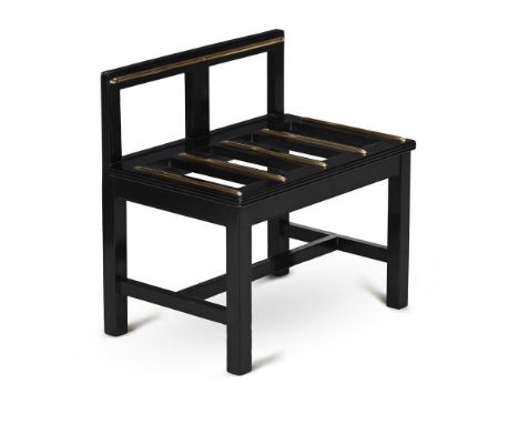 A LATE VICTORIAN EBONISED AND BRASS MOUNTED LUGGAGE STAND IN THE MANNER OF SHOOLBRED OR MAISON RINCK, LATE 19TH CENTURY Impre
