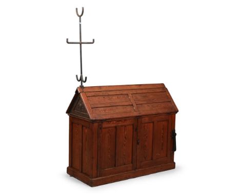 A RARE IRISH PITCH PINE SADDLE HORSE BY MUSGROVE & CO LTD., LATE 19TH CENTURY The cast iron ends bearing the Royal coat of ar