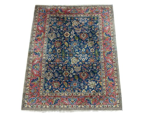 A TABRIZ CARPET CIRCA 1920 approximately 290 x 218cm   Condition Report:  Some wear overall commensurate with age and use. pa