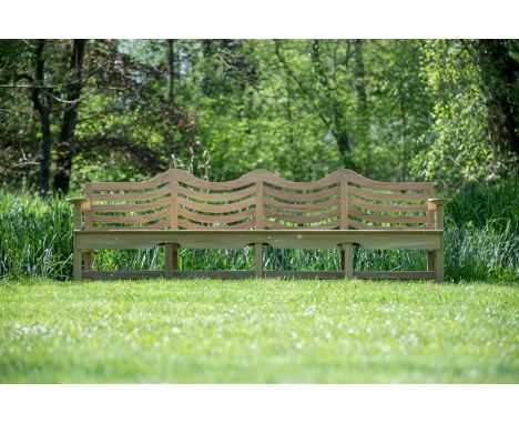 A TEAK 'MACKINTOSH' GARDEN BENCH  AFTER THE DESIGN BY CHARLES RENNIE MACKINTOSH, CONTEMPORARY 86cm high, 260cm wide, 87cm dee