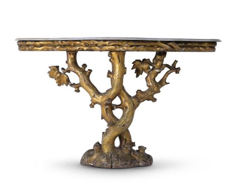 A CARVED GILTWOOD CONSOLE TABLE IN GEORGE II STYLE, MID 19TH CENTURY In the form of tree, with a shaped Carrara marble top 88