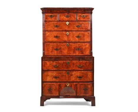 A FINE GEORGE II FIGURED WALNUT CHEST ON CHEST  CIRCA 1730 Cross banded and feather inlaid throughout, the cavetto cornice ab