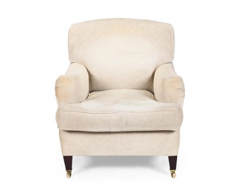 AN UPHOLSTERED ARMCHAIR BY GEORGE SMITH, IN THE MANNER OF HOWARD & SONS, MODERN With maker's and fire safety labels beneath s