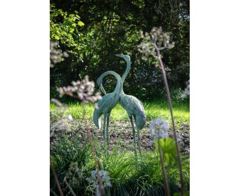 A PAIR OF JAPANESE LIFE SIZE BRONZE GARDEN CRANES  LATE 19TH CENTURY  153cm and 127.5cm high   Condition Report:  As per cata