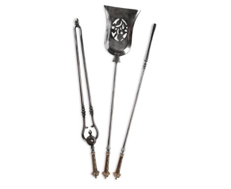A SET OF GEORGE IV THREE BRASS HANDLED POLISHED STEEL FIRE TOOLS  CIRCA 1825 Diaper pattern handles, chamfered stems   the sh