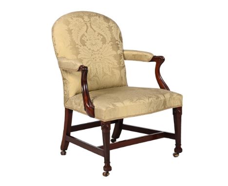 A GEORGE III MAHOGANY ARMCHAIR  IN THE MANNER OF THOMAS CHIPPENDALE, CIRCA 1770 The feet with leather casters 92.5cm high, 63