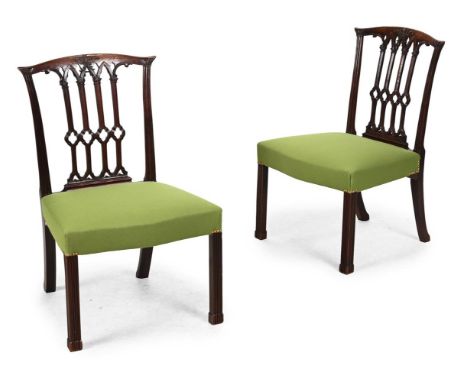 A PAIR OF GEORGE III MAHOGANY SIDE CHAIRS IN THE MANNER OF THOMAS CHIPPENDALE, CIRCA 1760 Upholstered with close nailed green