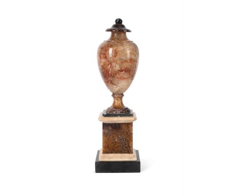 A GEORGE III FLUORSPAR AND BLUE JOHN URN ON PEDESTAL  CIRCA 1800-1820  28.5cm high, the base 9cm square   Condition Report:  