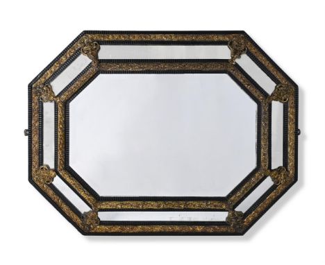 A FLEMISH EMBOSSED BRASS AND EBONISED MIRROR IN 18TH CENTURY STYLE, 19TH CENTURY The frame incorporating 'ripple' moulding 12