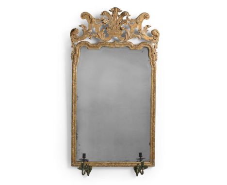 A GEORGE I CARVED GILTWOOD AND GESSO GIRANDOLE MIRROR CIRCA 1720 124cm high, 60.5cm wide   Condition Report:  Marks, knocks, 