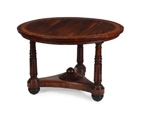 Y A WILLIAM IV GONCALO ALVES AND MARQUETRY CENTRE TABLE IN THE MANNER OF GEORGE BULLOCK, CIRCA 1830 Recessed brass casters to