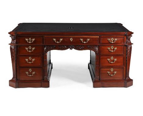 A MAHOGANY 'DUKE OF WELLINGTON' DESK IN GEORGE III STYLE, CONTEMPORARY  With a tooled leather inset top, the kneehole with a 