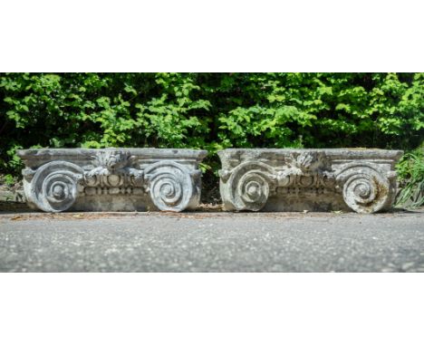 A PAIR OF CARVED PORTLAND STONE CAPITALS IN THE CORINTHIAN ORDER, 18TH CENTURY slight variances in dimensions, one 33cm high,