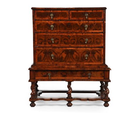 A WILLIAM & MARY OLIVEWOOD 'OYSTER' VENEERED CHEST ON STAND CIRCA 1690 111cm high, 92cm wide, 63cm deep overall  Condition Re