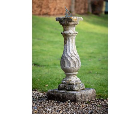 A PORTLAND STONE SUNDIAL  EARLY 19TH CENTURY The dial inscribed 'STAND AMONG YE SUMMER FLOWERS, AND TELL YE PASSING OF YE HOU