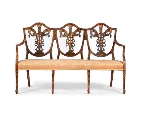 A GEORGE III PAINTED AND POLYCHROME PAINTED SETTEE IN THE MANNER OF SEDDON, SONS AND SHACKLETON, CIRCA 1790 94cm high, 146cm 