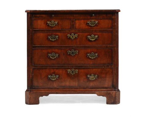 Y  A GEORGE III EXOTIC HARDWOOD AND CROSSBANDED BACHELOR'S CHEST OF DRAWERS CIRCA 1760 With a brushing slide 77cm high, 78cm 