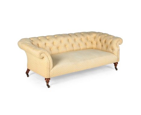 A VICTORIAN WALNUT AND UPHOLSTERED CHESTERFIELD SOFA BY HOWARD & SONS, LATE 19TH CENTURY One back leg stamped '4192 0204', th