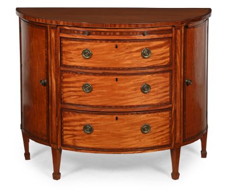 Y  A GEORGE III SATINWOOD AND TULIPWOOD CROSSBANDED DEMI-LUNE COMMODE CIRCA 1790 The brushing slide with inset baize, the sid