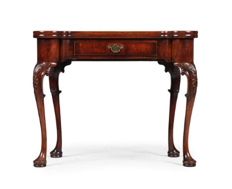 A GEORGE II MAHOGANY CARD TABLE CIRCA 1750 The hinged top with baize inset and dished candle stands to the corners, supported