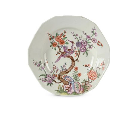 A VIENNA (DU PACQUIER) DODECAGONAL PLATE CIRCA 1730 Painted with an exotic bird perched on a tree with flowers issuing from s