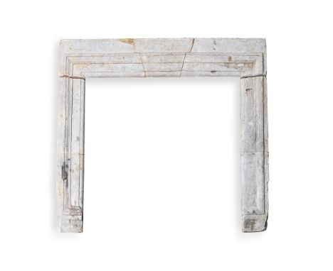 A CARVED STONE FIREPLACE SURROUND  PROBABLY LATE 17TH OR EARLY 18TH CENTURY  134cm high, 150cm wide internal aperture 107cm h