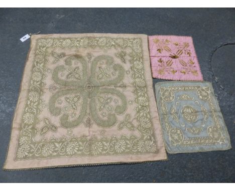 A PINK SILK PANEL WORKED IN SILVER THREAD WITH A QUATREFOIL WITHIN FLORAL BAND.   96 x 89cms. TOGETHER WITH TWO SMALLER PINK 