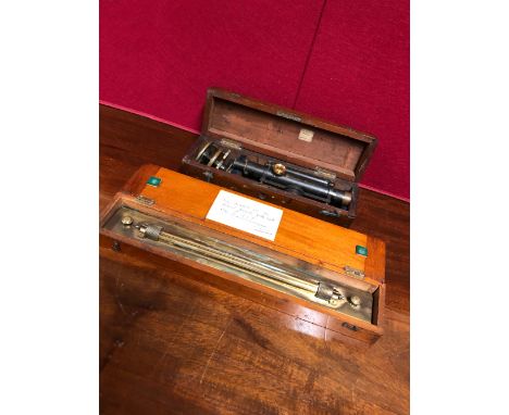 A MAHOGANY CASED CASARTELLI OF MANCHESTER SURVEYORS LEVEL BLACKENED BUT FOR THE BRASS FOCUSSING KNOB, THE CASE.   W 35cms. TO