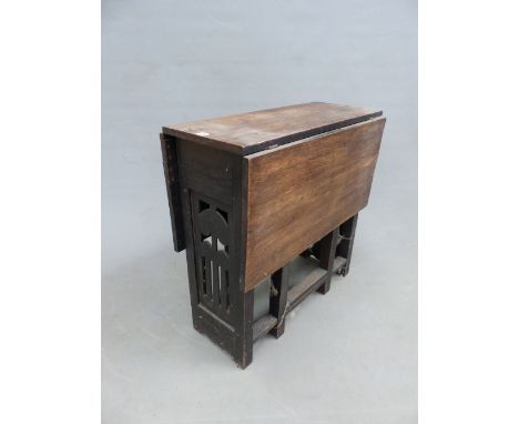 AN ARTS AND CRAFTS LIBERTY TYPE OAK DROP LEAF GATE LEG SMALL TABLE.  106 x 76 x 74cms H.