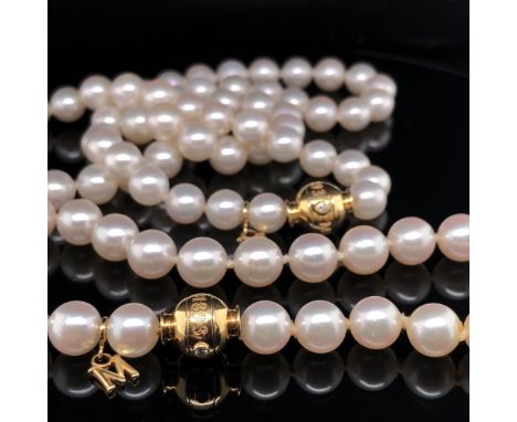 A SUITE OF MIKIMOTO PEARL JEWELLERY COMPRISING OF A GRADUATED AND KNOTTED NECKLACE AND BRACELET EACH WITH 18ct GOLD BALL CLAS
