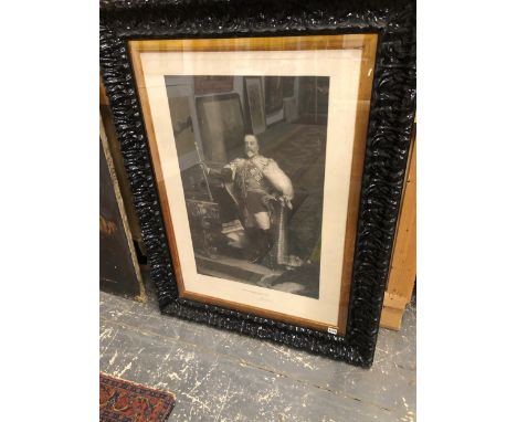 A LARGE FRAMED VINTAGE BLACK AND WHITE PORTRAIT PRINT OF GEORGE V.  90 x 63cms.