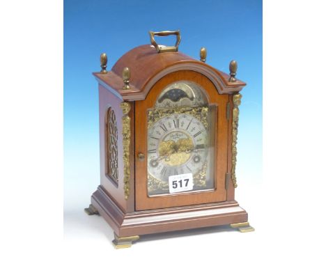 A WUBA MAHOGANY CASED MANTEL CLOCK, THE MOVEMENT CHIMING ON TWO BELLS, THE SILVERED DIAL WITH BRASS SPANDRELS AND MOON PHASE 