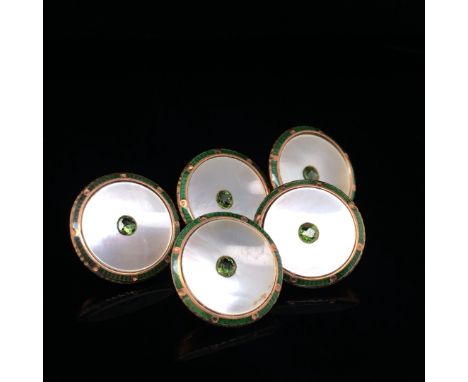 A SET OF FIVE 9ct GOLD AND ENAMEL BUTTONS IN A FITTED CASE. WEIGHT 6.5grms. 