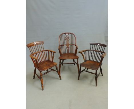 AN ANTIQUE ELM AND ASH WINDSOR CHAIR TOGETHER WITH TWO COMB BACK ELBOW CHAIRS