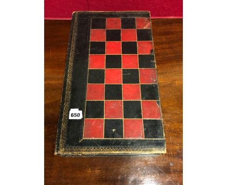 A RED, BLACK AND GILT LEATHER MOUNTED CHESS BOARD DISGUISED AS TWO VOLUMES ON THE HISTORY OF ENGLAND AND OPENING TO REVEAL A 