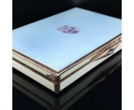 AN AUSTRO-HUNGARIAN SILVER GILT AND GUILLOCHE ENAMEL CIGARETTE BOX. THE TOP COVER WITH FINE ARMORIAL CARTOUCHE DEPICTING CROW