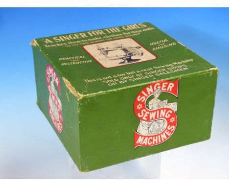 A BOXED SINGER SEWING MACHINE FOR GIRLS, A CARD DRAUGHTS BOARD WITH PLASTIC PIECES, VARIOUS BOARD GAME RULES AND A CHINESE CA