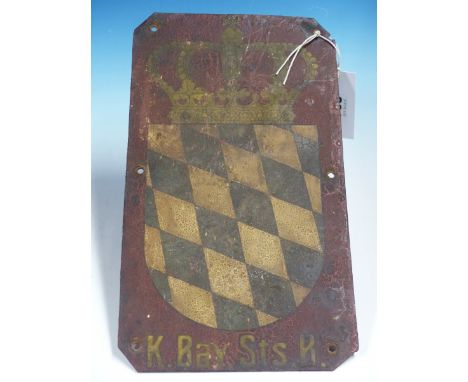 A ROYAL BAVARIAN RAILWAYS CARRIAGE PLATE PAINTED WITH THE CROWNED STATE ARMORIAL ON A RED GROUND ABOVE K. BAY. STS. R.   32.5