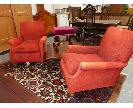 A PAIR OF VICTORIAN LIBRARY ARMCHAIRS UPHOLSTERED IN GOLD DIAMOND DIAPERED RED CORDUROY AND ON TURNED FRONT LEGS WITH BROWN C